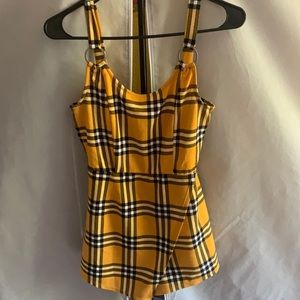 Yellow jumper it’s like short and skirt super cute 🥰